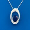 blue oval lapis set in silver beveled oval pendant