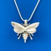 Pendant necklace in silver honeybee design with wings open