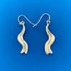 Silver earrings that are wavy like an abstract river
