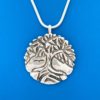 Pendant, silver necklace with tree of life design with leaves and roots